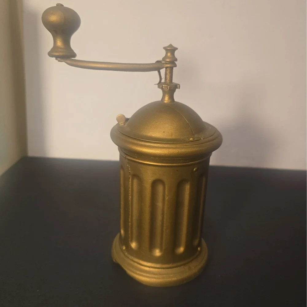 Antique F&B Tre Spade hand-crank coffee grinder with embossed three-spade logo.